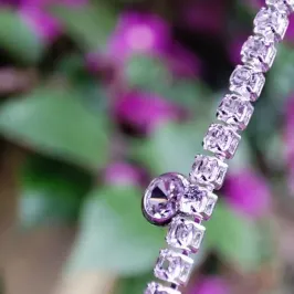 PULSEIRA CRAVEJADA ZIRCONIAS CRISTAL + PINGENTE MEIA LUA BP