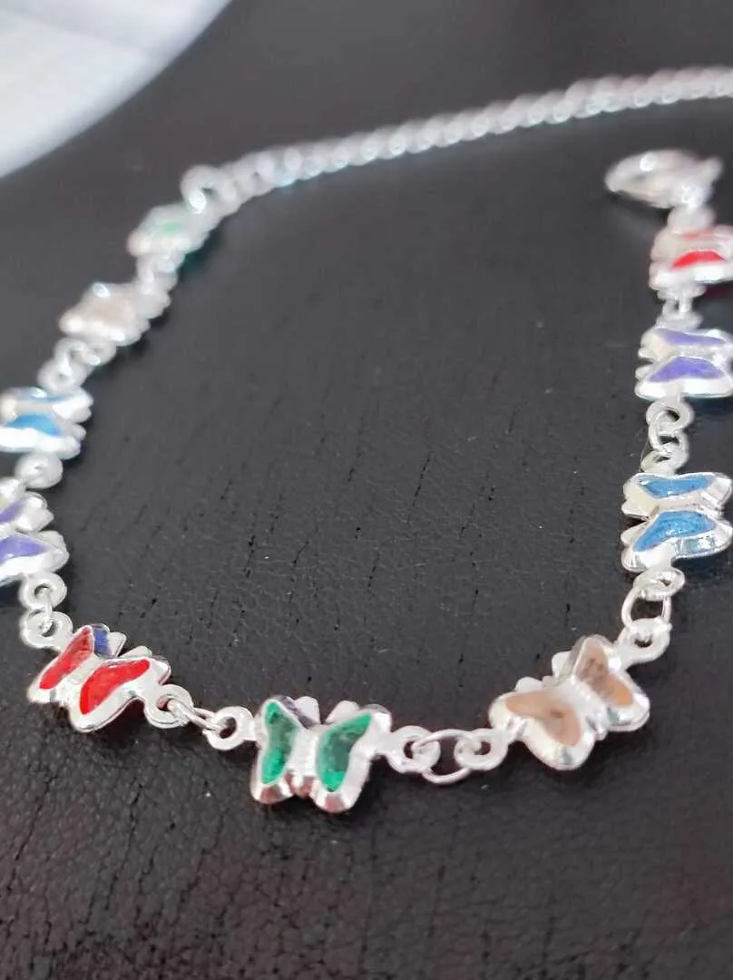 PULSEIRA PINGENTES BORBOLETAS EM ZIRCONIAS COLORIDAS BP