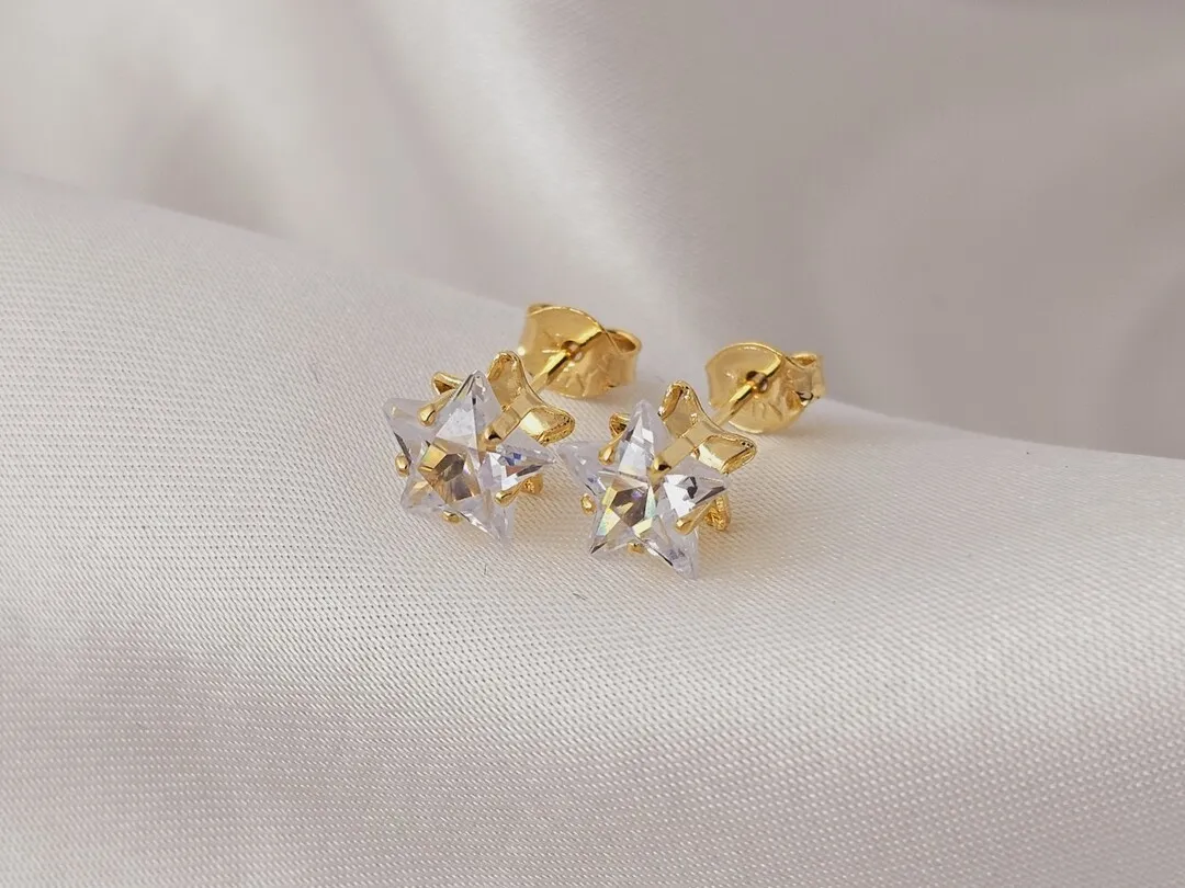 BRINCO ESTRELA DE ZIRCONIA BD