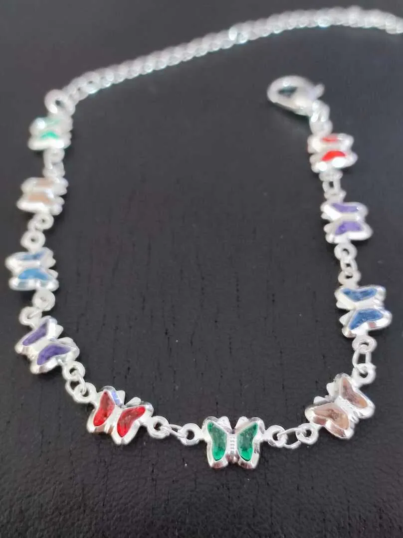 PULSEIRA PINGENTES BORBOLETAS EM ZIRCONIAS COLORIDAS BP